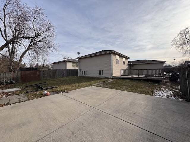 16426 Homan Ave, Markham, IL 60428 - back of house featuring a wooden deck, a patio area, fence private yard, and a lawn