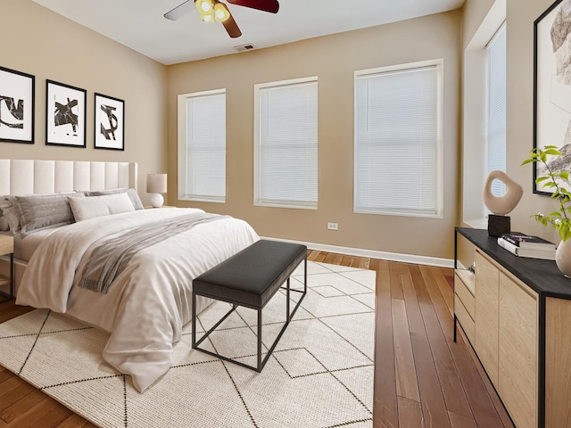 4731 S Ingleside Ave Unit C3, Chicago, IL 60615 - bedroom featuring hardwood / wood-style floors, visible vents, a ceiling fan, and baseboards