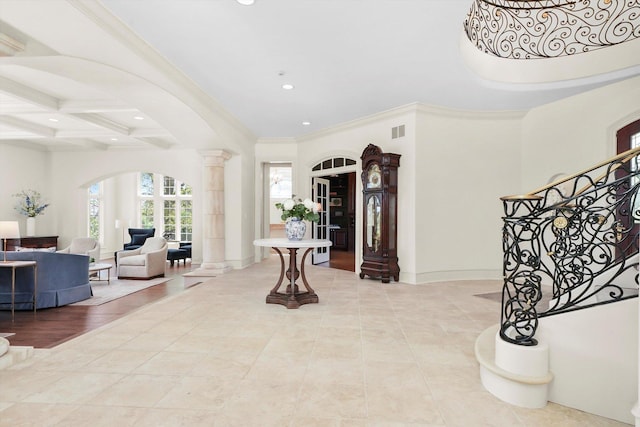 96 S Wynstone Dr, North Barrington, IL 60010 - tiled foyer entrance featuring arched walkways, recessed lighting, ornate columns, beam ceiling, and stairs