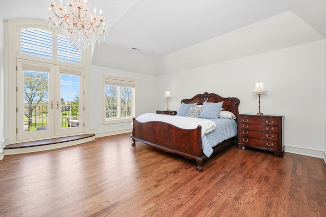 96 S Wynstone Dr, North Barrington, IL 60010 - bedroom featuring access to exterior, a chandelier, wood finished floors, and french doors