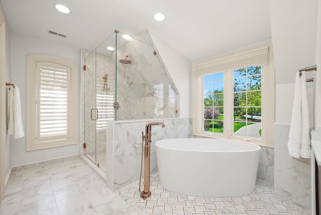 96 S Wynstone Dr, North Barrington, IL 60010 - bathroom with a freestanding bath, a marble finish shower, marble finish flooring, recessed lighting, and wainscoting
