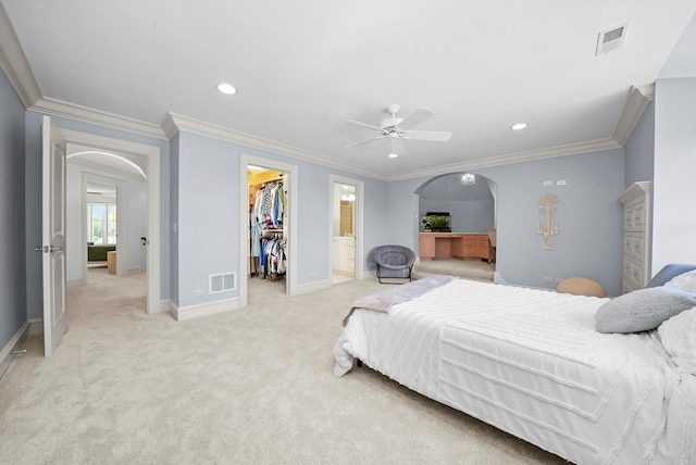 96 S Wynstone Dr, North Barrington, IL 60010 - bedroom with arched walkways, a spacious closet, a closet, light colored carpet, and recessed lighting