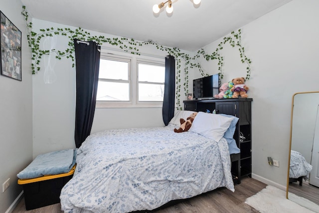 7709 161st St, Tinley Park, IL 60477 - bedroom with baseboards and wood finished floors