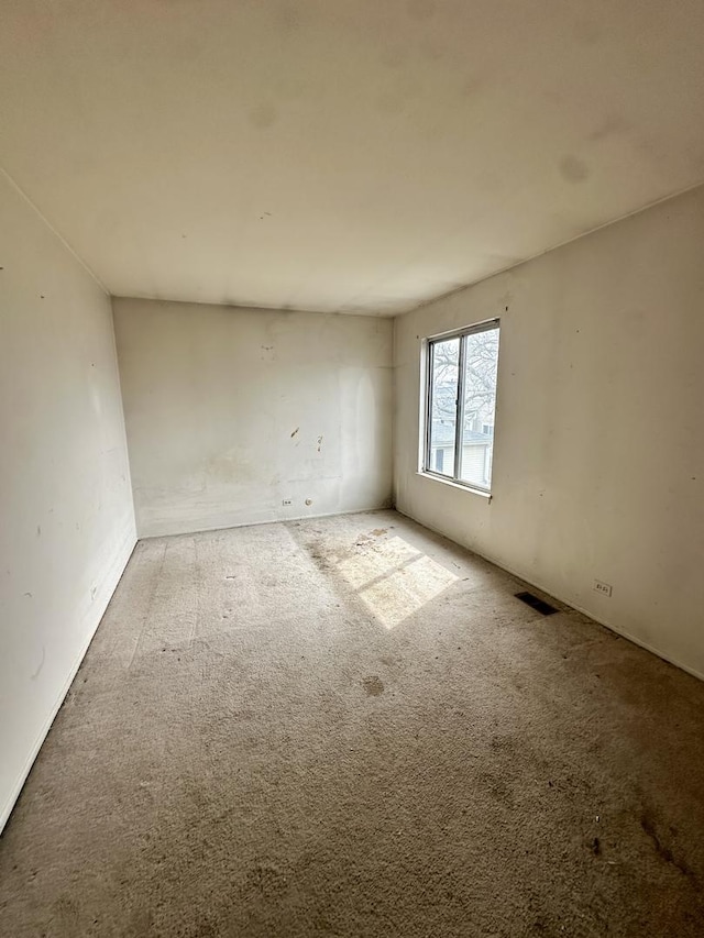 spare room with visible vents