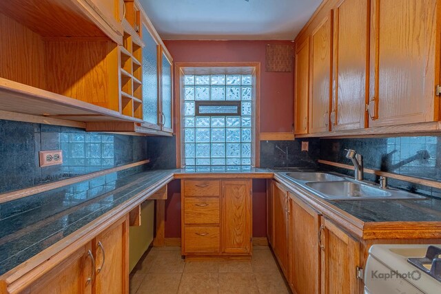 2051 E 72nd St Unit 1B, Chicago, IL 60649 - empty room with a baseboard heating unit, wood finished floors, and ceiling fan