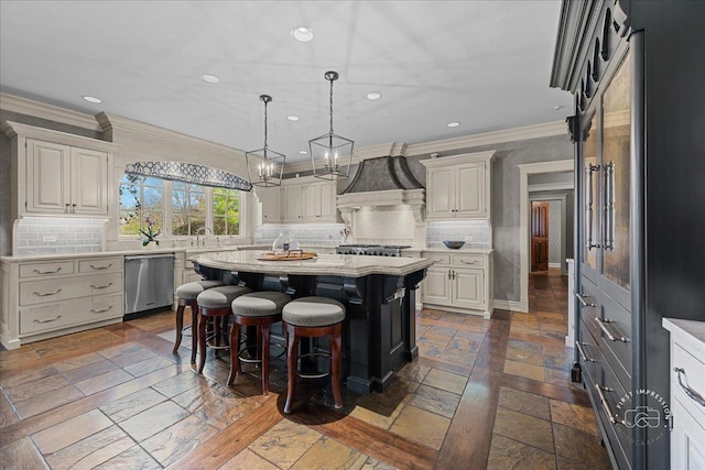36W442 Hunters Gate Rd, Saint Charles, IL 60175 - kitchen featuring stainless steel dishwasher, premium range hood, light countertops, crown molding, and stone tile flooring