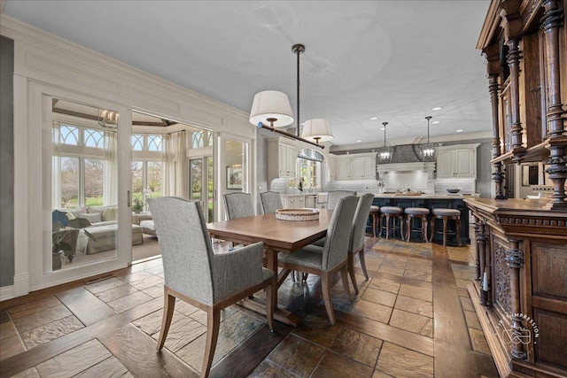 36W442 Hunters Gate Rd, Saint Charles, IL 60175 - dining room with crown molding, plenty of natural light, recessed lighting, stone tile flooring, and a chandelier