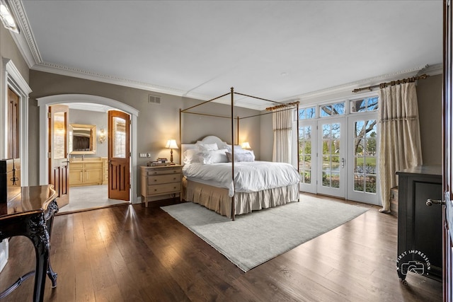 36W442 Hunters Gate Rd, Saint Charles, IL 60175 - bedroom with arched walkways, crown molding, access to exterior, wood finished floors, and connected bathroom
