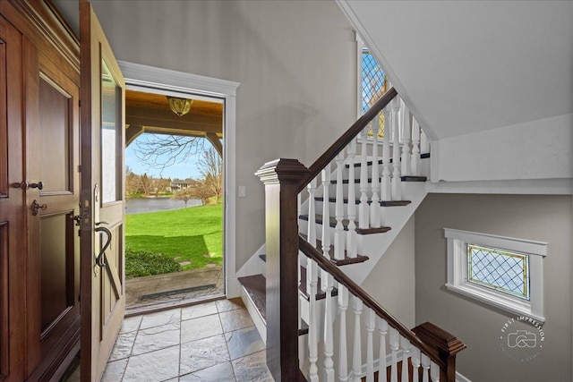 36W442 Hunters Gate Rd, Saint Charles, IL 60175 - entryway with a water view, stairway, and stone tile floors