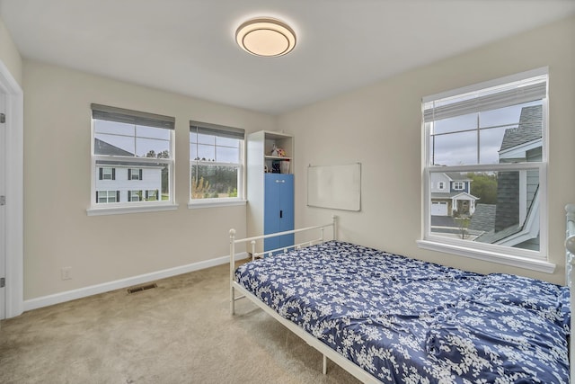 34 Commons Cir, Hawthorn Woods, IL 60047 - carpeted bedroom with baseboards and visible vents