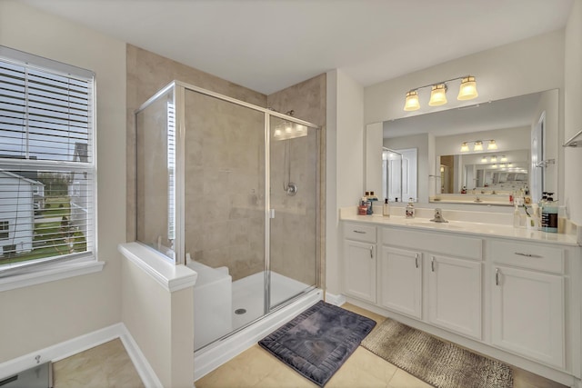 34 Commons Cir, Hawthorn Woods, IL 60047 - full bathroom with vanity, tile patterned floors, baseboards, and a stall shower