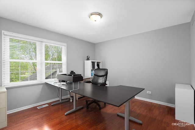 office with wood finished floors and baseboards