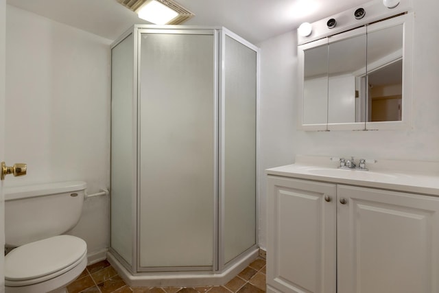 full bathroom featuring vanity, toilet, and a stall shower