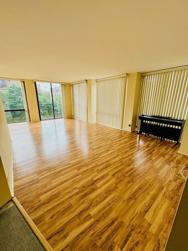 345 W Fullerton Pkwy Unit 503, Chicago, IL 60614 - empty room featuring a wall of windows and wood finished floors
