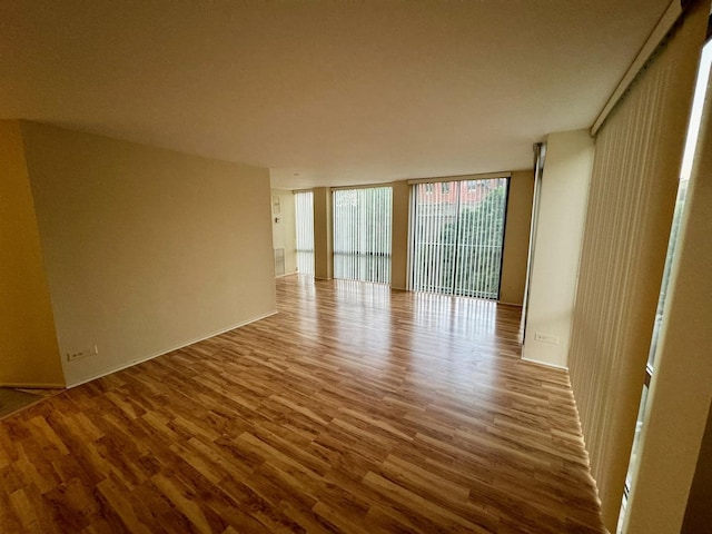345 W Fullerton Pkwy Unit 503, Chicago, IL 60614 - spare room featuring wood finished floors and expansive windows