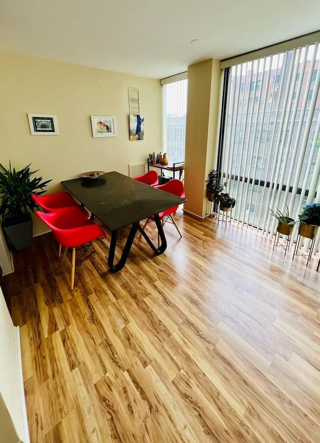 345 W Fullerton Pkwy Unit 503, Chicago, IL 60614 - dining room featuring wood finished floors and floor to ceiling windows