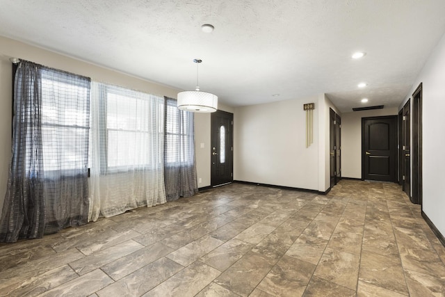 interior space featuring visible vents, baseboards, and recessed lighting