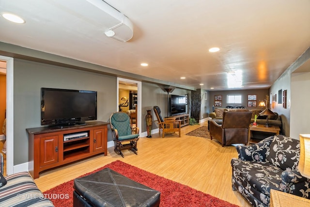living area featuring recessed lighting and light wood-type flooring