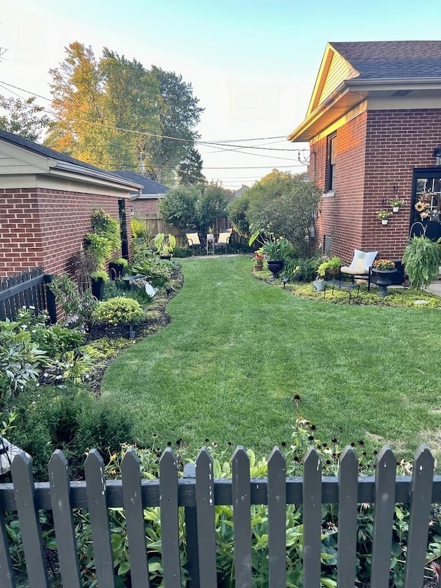 view of yard featuring fence