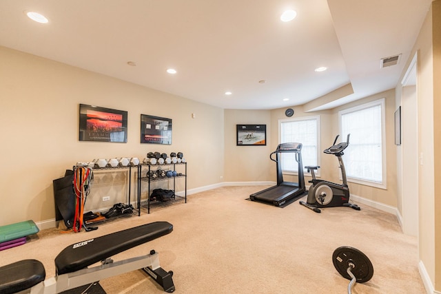 exercise room featuring visible vents, baseboards, recessed lighting, and carpet