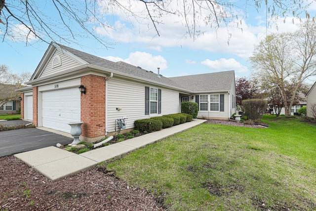 108 W Essington Dr Unit 108, Round Lake, IL 60073 - single story home featuring brick siding, a garage, a front lawn, and driveway