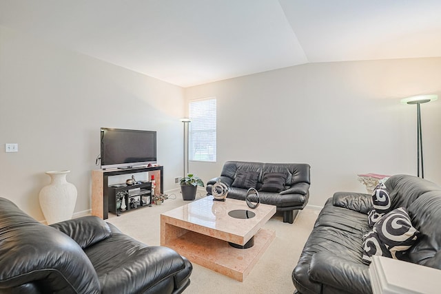 108 W Essington Dr Unit 108, Round Lake, IL 60073 - living room featuring carpet floors, baseboards, and vaulted ceiling