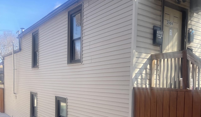 view of property exterior with fence