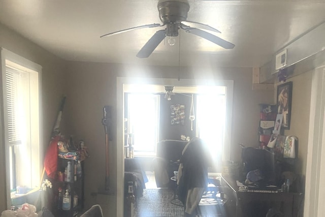 entrance foyer with visible vents and a ceiling fan