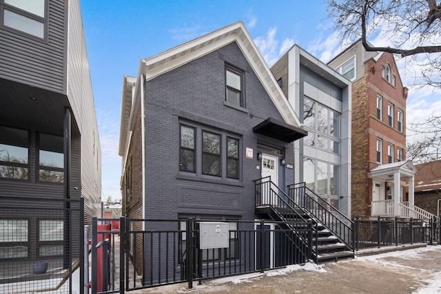 1851 W Dickens Ave, Chicago, IL 60647 - view of front of property with brick siding and fence