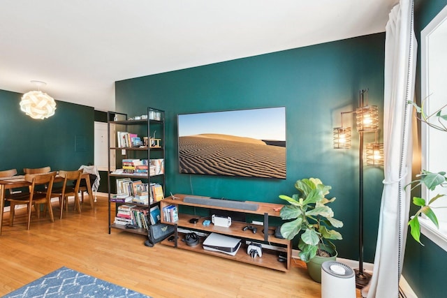 sitting room featuring wood finished floors
