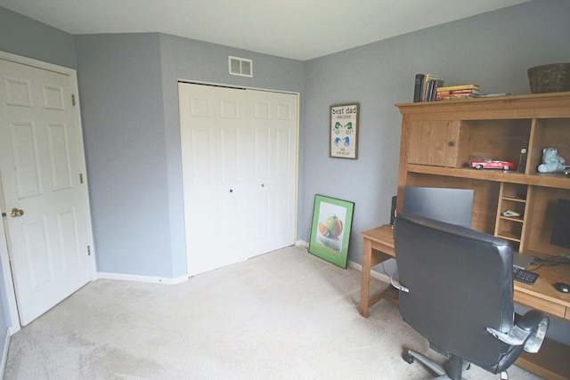 office area featuring carpet floors, visible vents, and baseboards