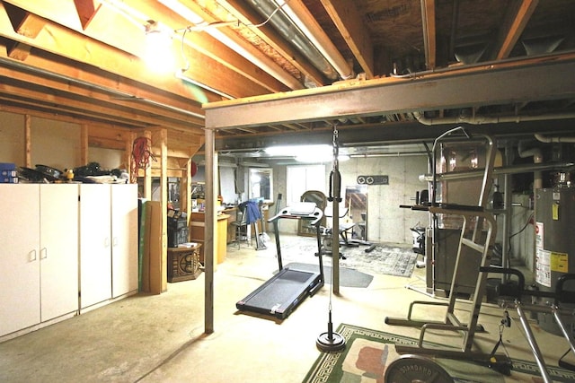 exercise area featuring gas water heater