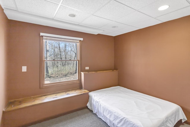 bedroom featuring recessed lighting, a drop ceiling, and carpet floors