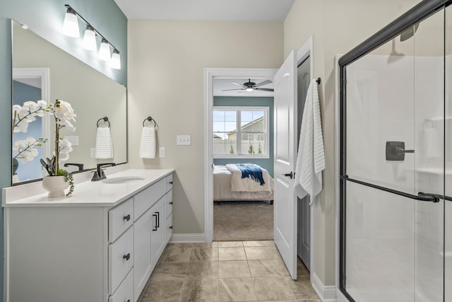 6367 Jasmine Ave, Portage, IN 46368 - ensuite bathroom with a ceiling fan, a stall shower, vanity, marble finish floor, and baseboards