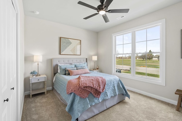 6367 Jasmine Ave, Portage, IN 46368 - carpeted bedroom featuring baseboards, visible vents, and ceiling fan