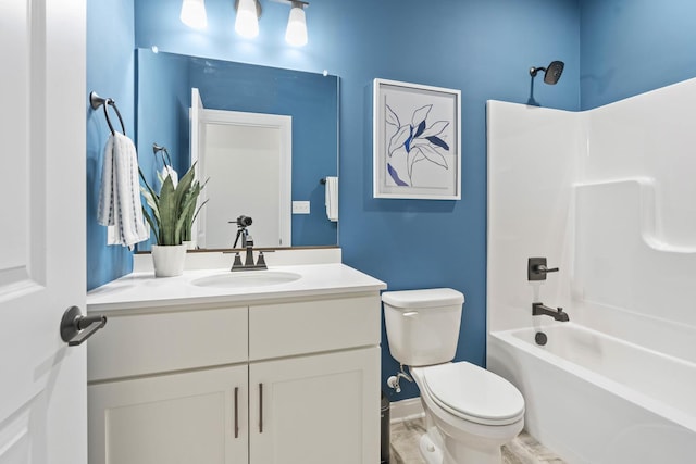 6367 Jasmine Ave, Portage, IN 46368 - full bath with baseboards, toilet, vanity, and shower / tub combination
