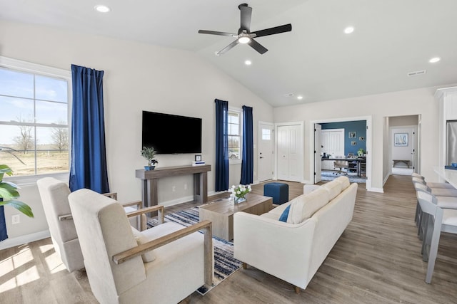 6367 Jasmine Ave, Portage, IN 46368 - living area with wood finished floors, a ceiling fan, baseboards, and vaulted ceiling