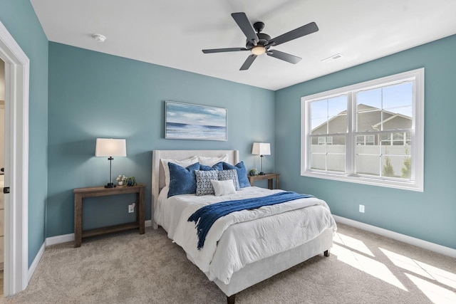 6367 Jasmine Ave, Portage, IN 46368 - bedroom with baseboards, a ceiling fan, visible vents, and carpet flooring