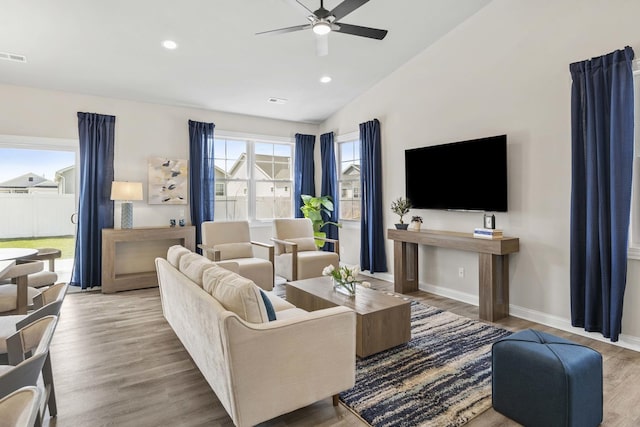 6367 Jasmine Ave, Portage, IN 46368 - living room featuring recessed lighting, vaulted ceiling, wood finished floors, a ceiling fan, and baseboards