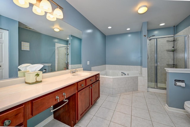 2136 Yale Cir, Hoffman Estates, IL 60192 - bathroom with tile patterned floors, a garden tub, vanity, and a stall shower