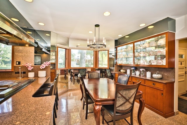 6776 N Laporte Ave, Lincolnwood, IL 60712 - dining area featuring granite tiled floors, recessed lighting, and a chandelier
