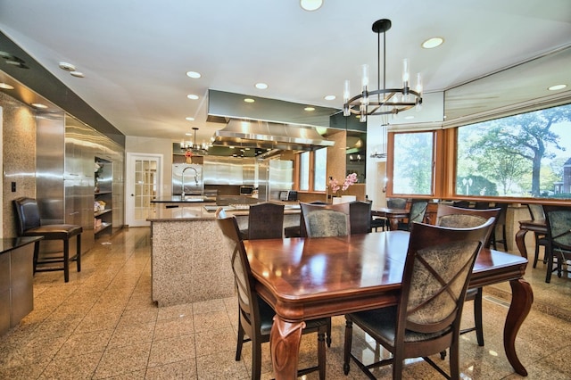 6776 N Laporte Ave, Lincolnwood, IL 60712 - dining area featuring a chandelier, recessed lighting, and granite tiled floors
