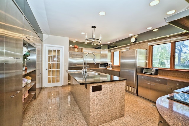 6776 N Laporte Ave, Lincolnwood, IL 60712 - kitchen with stainless steel fridge, granite tiled floors, recessed lighting, high end fridge, and hanging light fixtures
