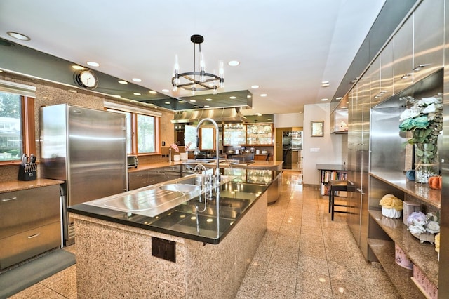6776 N Laporte Ave, Lincolnwood, IL 60712 - kitchen with freestanding refrigerator, modern cabinets, a chandelier, a large island, and recessed lighting
