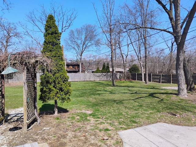 view of yard with fence