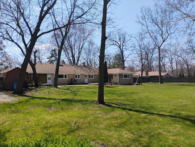 view of yard featuring fence