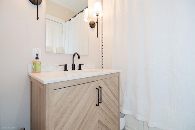 full bath featuring vanity and curtained shower