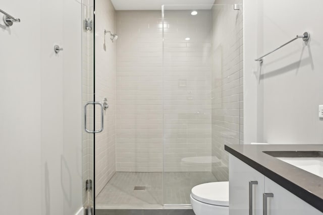 1701 W Webster Ave Unit 512, Chicago, IL 60614 - full bathroom featuring toilet, a stall shower, and vanity