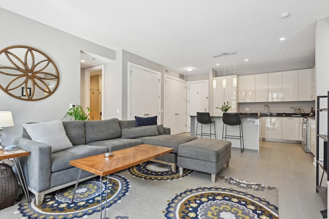 1701 W Webster Ave Unit 512, Chicago, IL 60614 - living room with visible vents and light wood finished floors