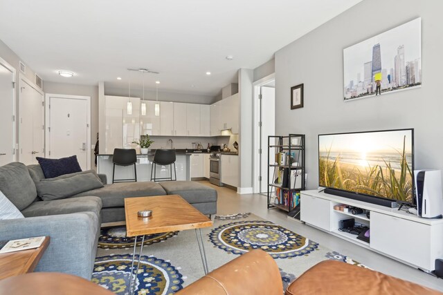 1701 W Webster Ave Unit 512, Chicago, IL 60614 - living area with finished concrete flooring and visible vents